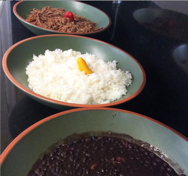 Rice Caraotas Negras Carne Mechada, private chef, Venezuelan cuisine, meat dish, gourmet cuisine, food presentation, culinary creations, luxury dining, fine dining, event catering, event planning.