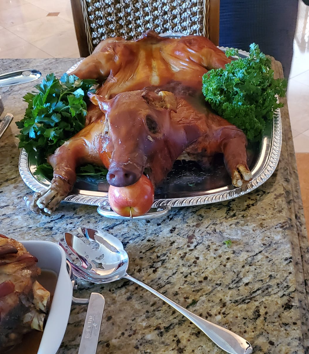 Cuban Christmas, Christmas Eve, holiday traditions, roast pig, Cuban cuisine, Christmas dinner, holiday feast, cultural celebration, family gathering, traditional food.